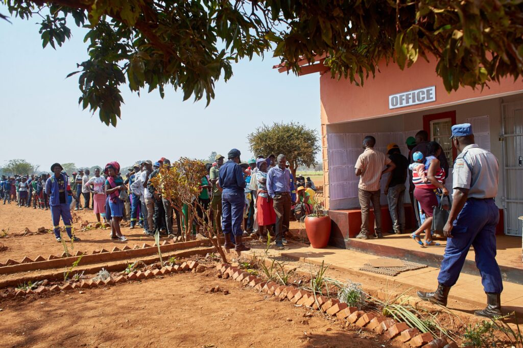 Dozens of poll monitors arrested in tense Zimbabwe vote