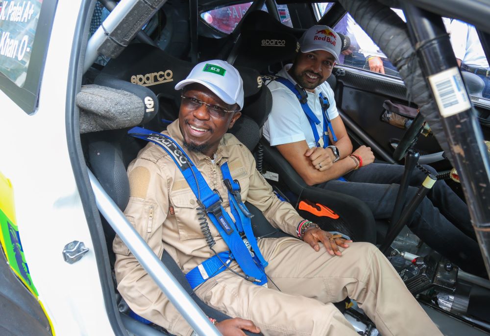 Sports CS Ababu Namwamba with Karan Patel during a past safari rally competition. Photo: Courtesy 