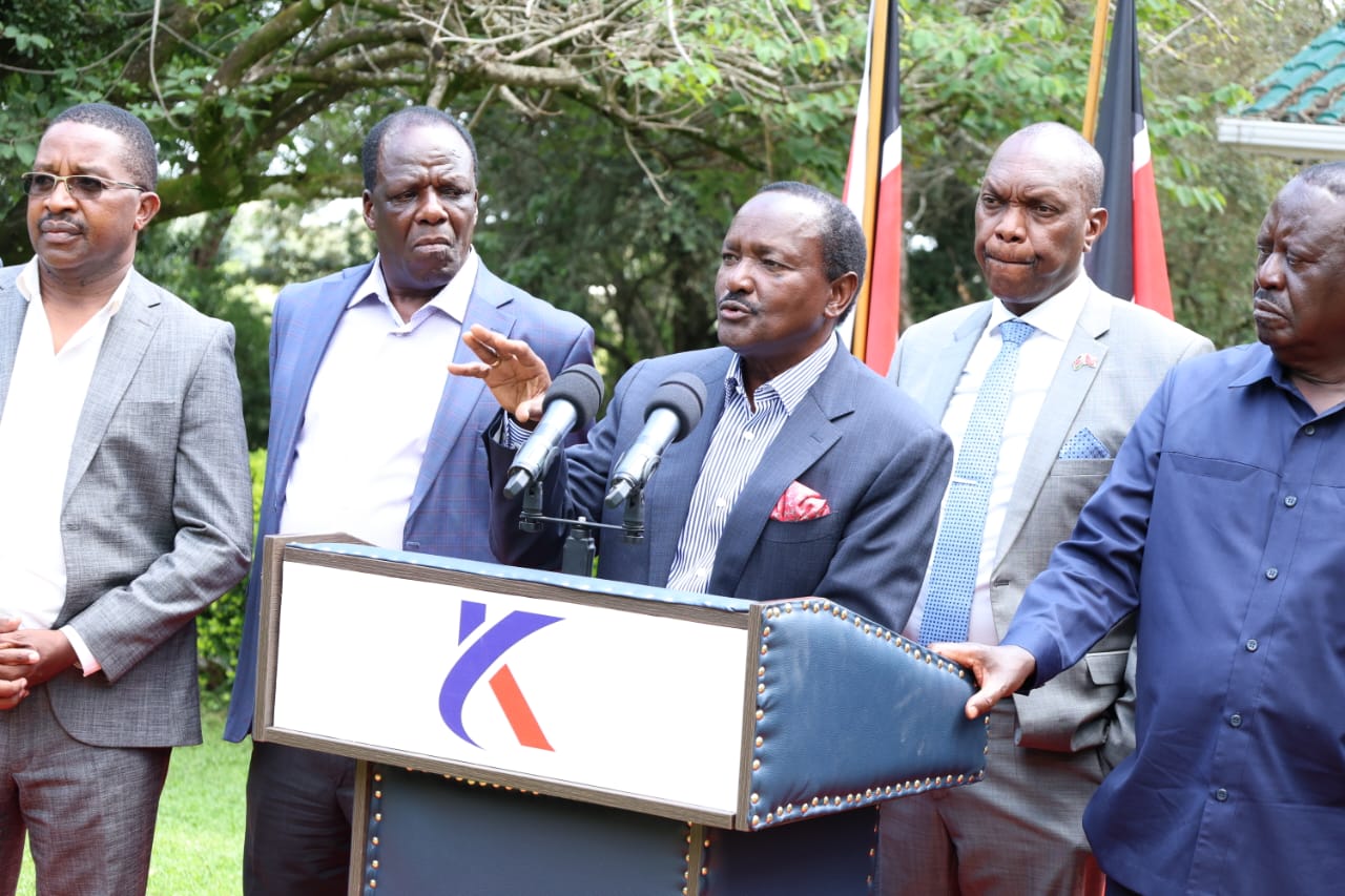 Azimio-One Kenya Co-Principal Kalonzo Musyoka, flanked by other opposition coalition leaders, speak to the press.