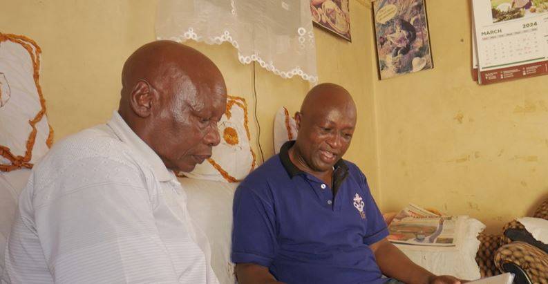 Kiswahili and Geography teacher Kepha Ng'ang'a (right) with his friend Joseph Mbau. Photo: TV47
