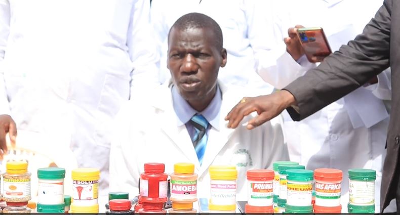 Dr Patrick Murugu displaying some of the herbal medicine at his office in Meru. Photo/TV47