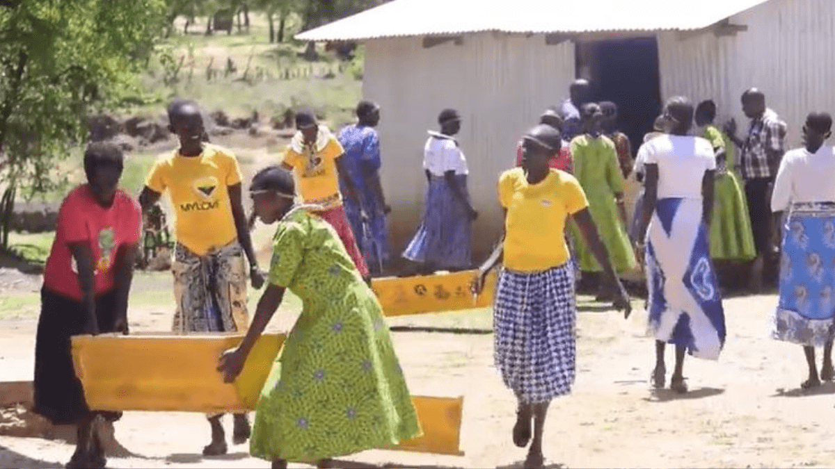 A section of women from Naramaam village in West Pokot pick beehives from a well wisher. Photo/TV47