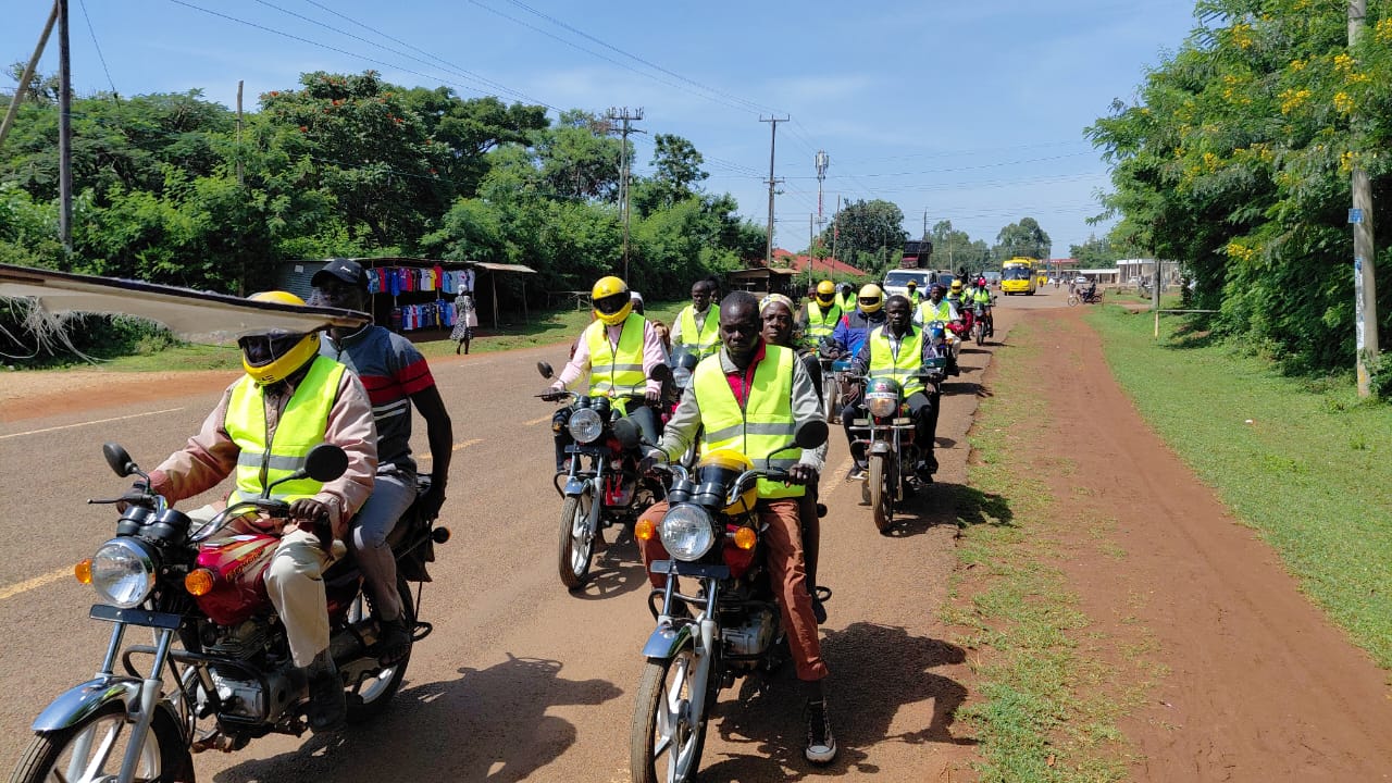 Members of Chaoba Sacco in Siaya riding new motorbikes
