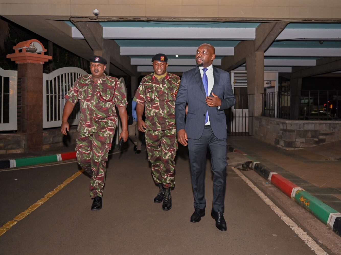 Interior CS Kipchumba Murkomen with police officers at Harambee House, Nairobi, on June 25, 2025.