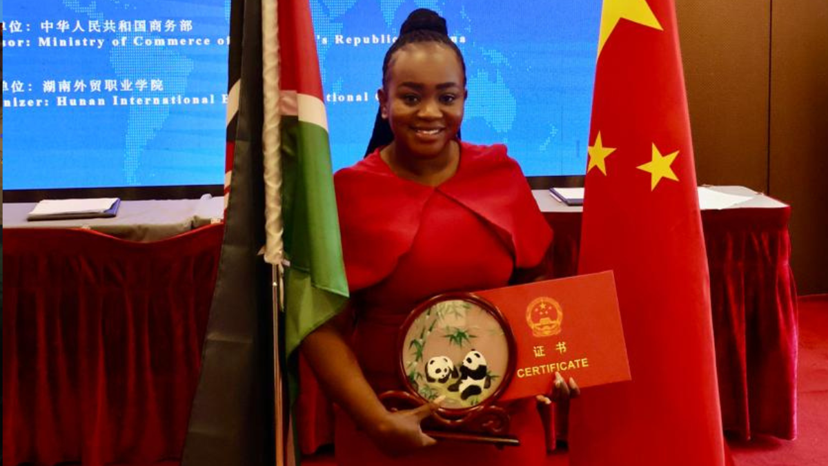 TV47’s Elizabeth Mutuku after receiving the award on New Media Management in China.