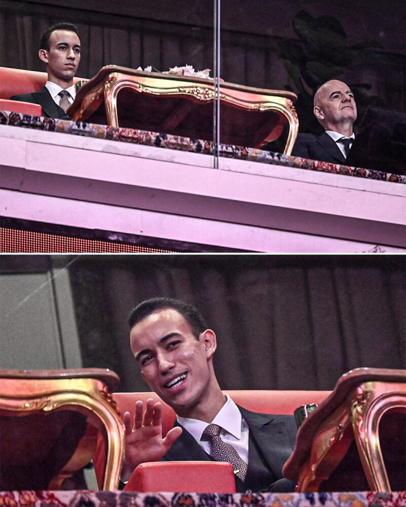 Morocco’s Crown Prince Moulay Hassan watches from the stands alongside FIFA President Gianni Infantino during the Morocco vs. Comoros match. Photo: X