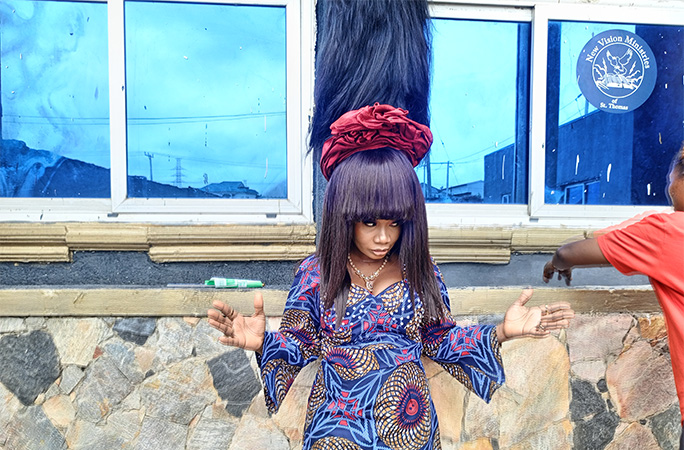 Nigerian Wig maker sets Guinness World Record for the tallest wig