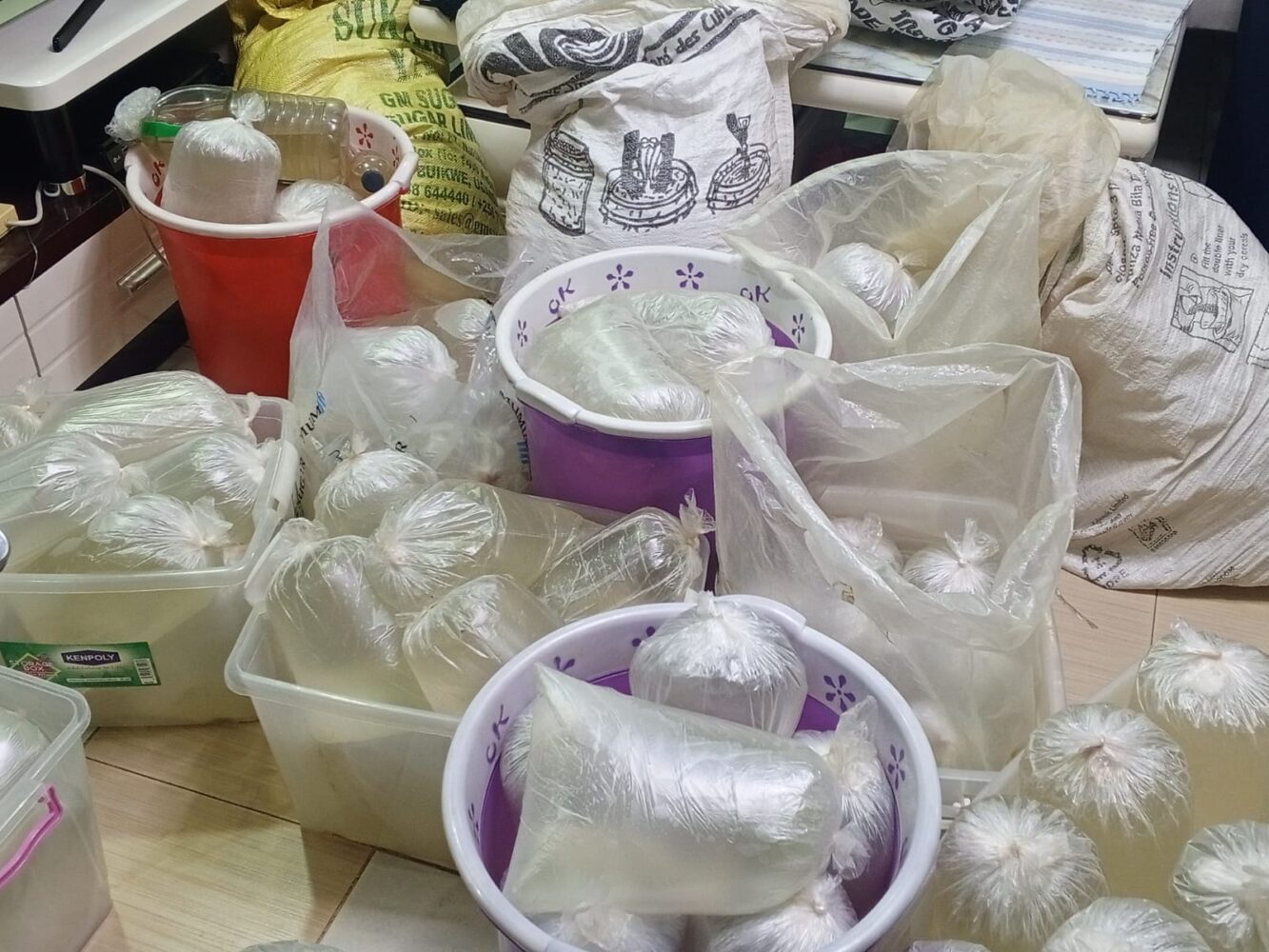 Police seize 395 litres of chang’aa during security operation in Nyalenda, Kisumu