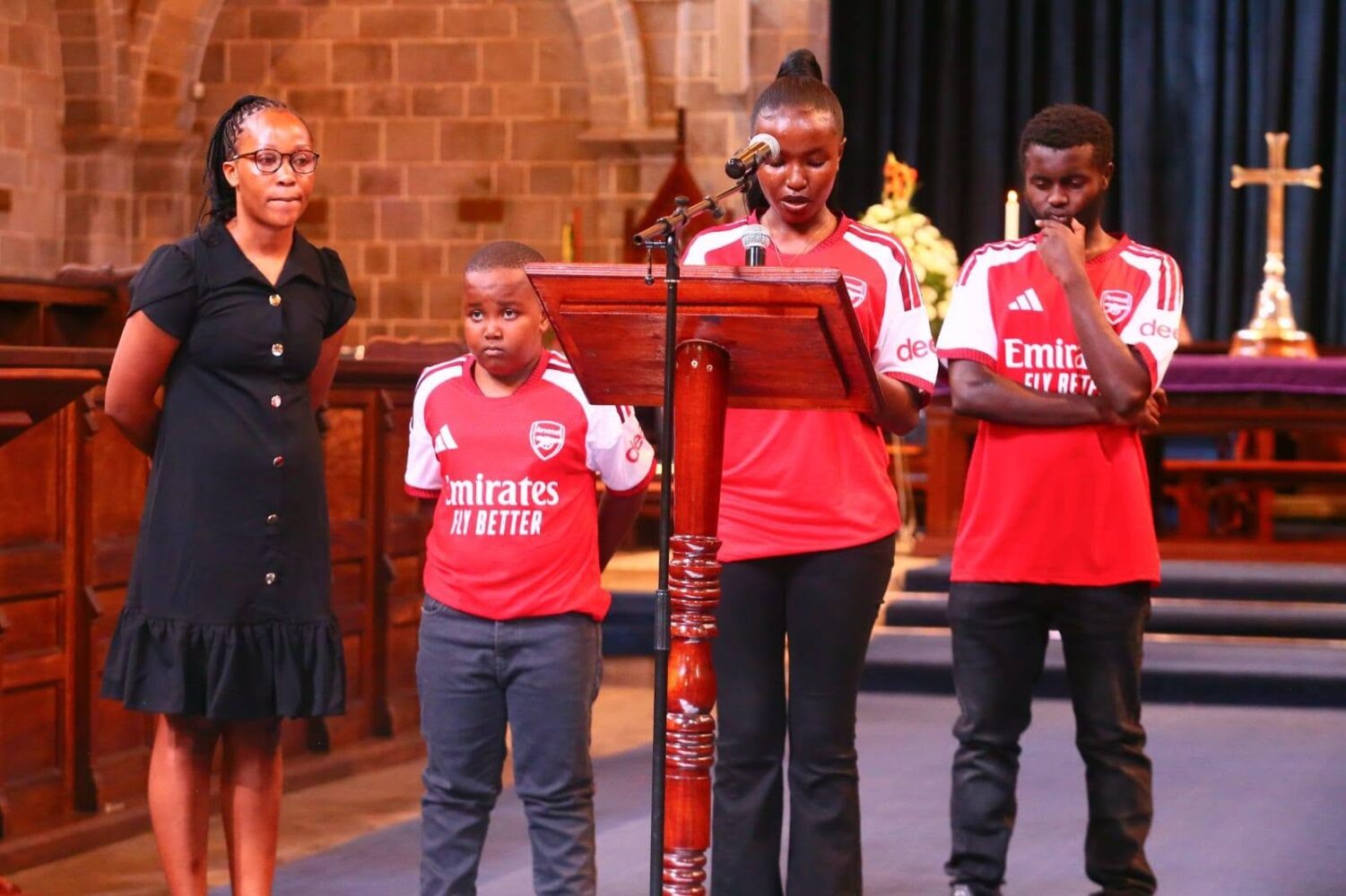 Diblo Kaberia’s children pay tribute to his Love for football by Wearing Arsenal Jerseys at Requiem Mass at All Saints Cathedral. Photo: Facebook