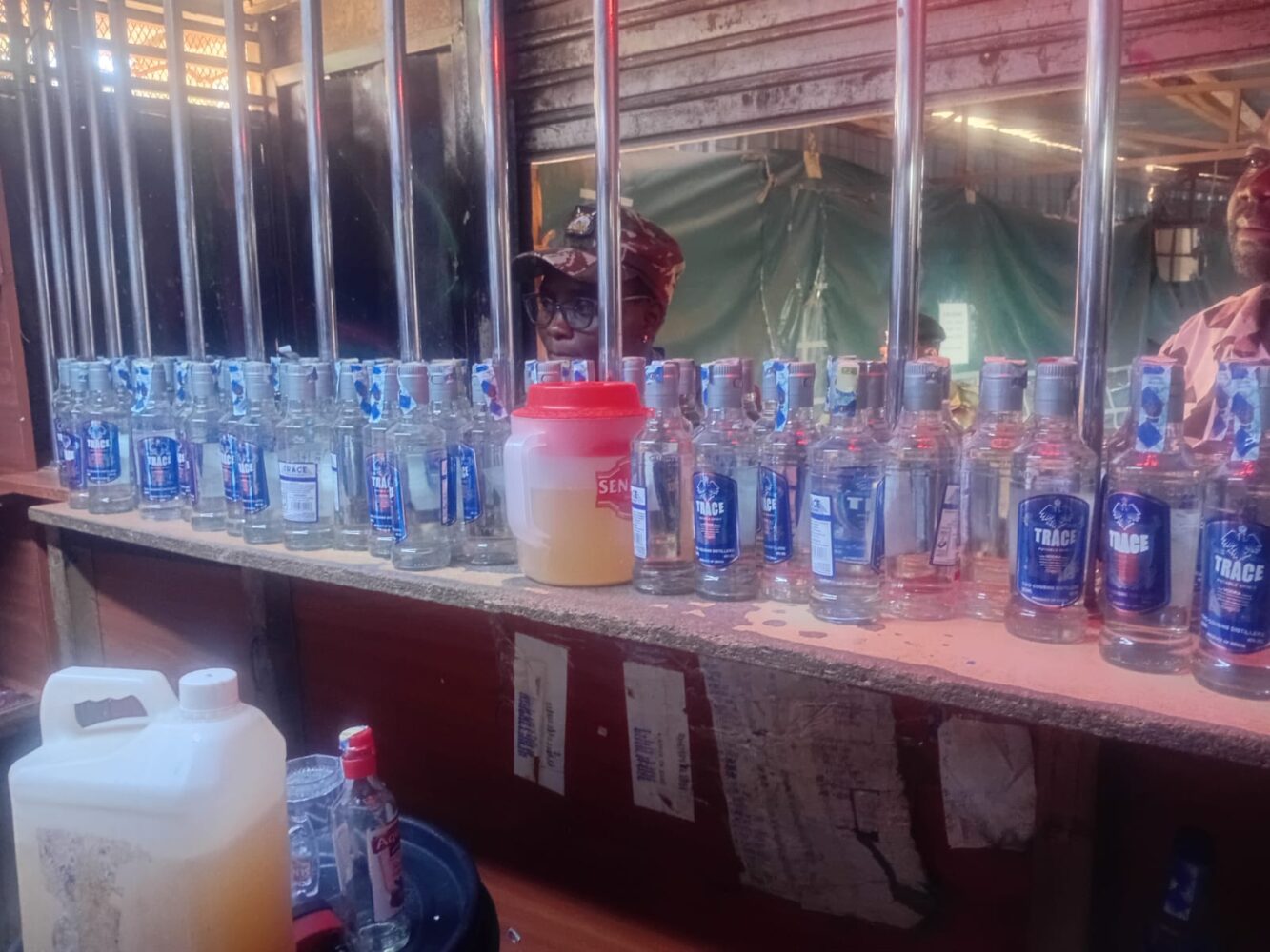 Woman caught red-handed mixing counterfeit alcohol, two others arrested as NACADA strikes again in Nairobi’s Jericho area