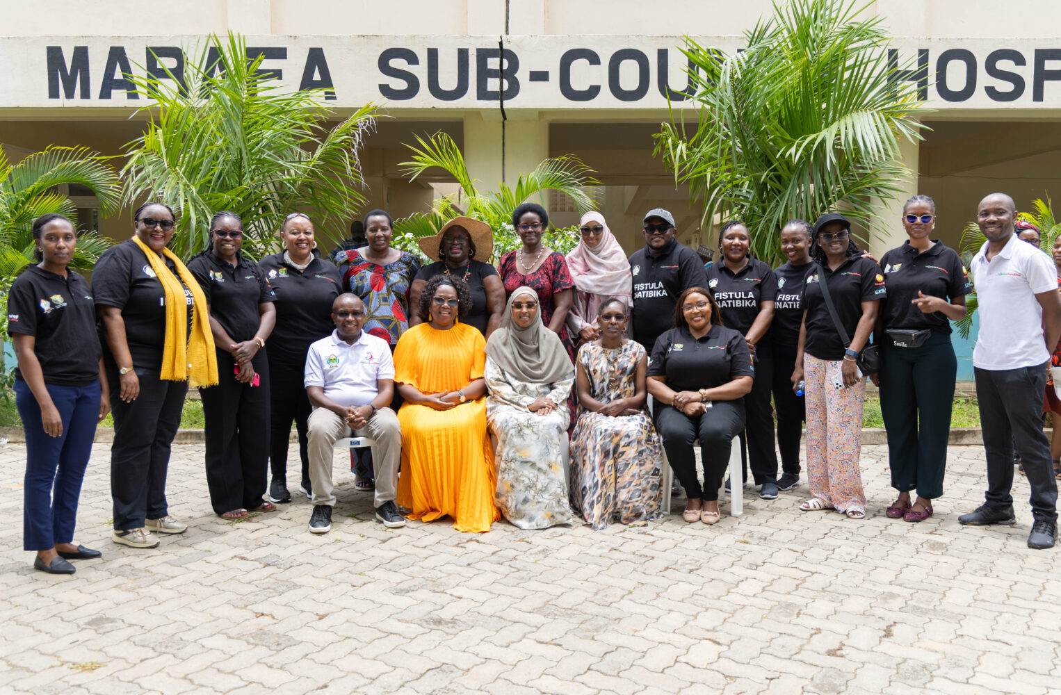 Health officials and partners pose for a group photo at Marafa Sub-County Hospital during a fistula medical camp in Kilifi County. The camp brought together the Ministry of Health, County First Ladies Association (CFLA), M-Pesa Foundation, AMREF Health Africa and the Flying Doctors Society of Africa to expand access to fistula treatment.