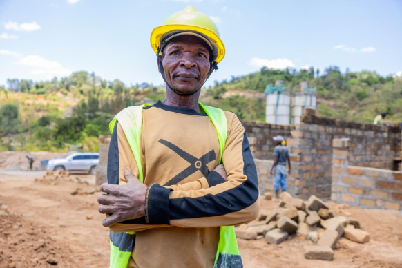 Dominic Njagi is among the residents happy to see the construction moving on well and has benefited by getting a job.